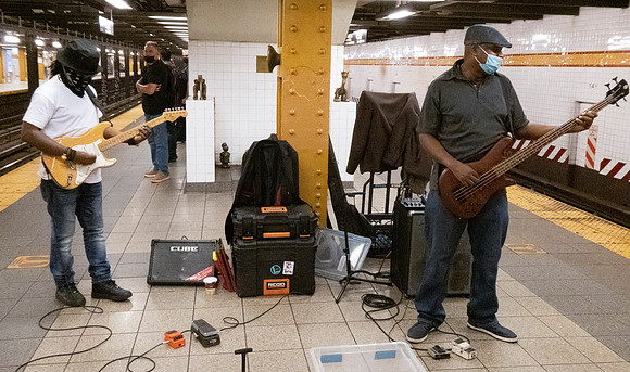 musicians at W. 14th Street station